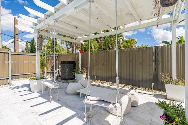 view of patio / terrace featuring a pergola