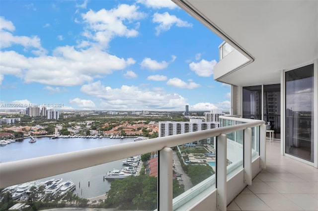 balcony featuring a water view