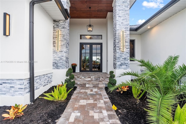 property entrance featuring french doors