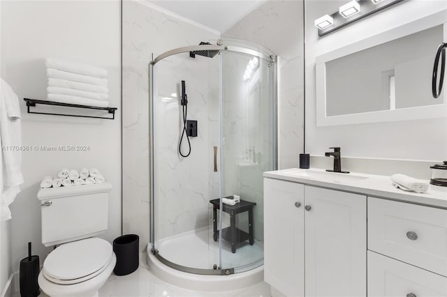 bathroom with vanity, ornamental molding, an enclosed shower, and toilet