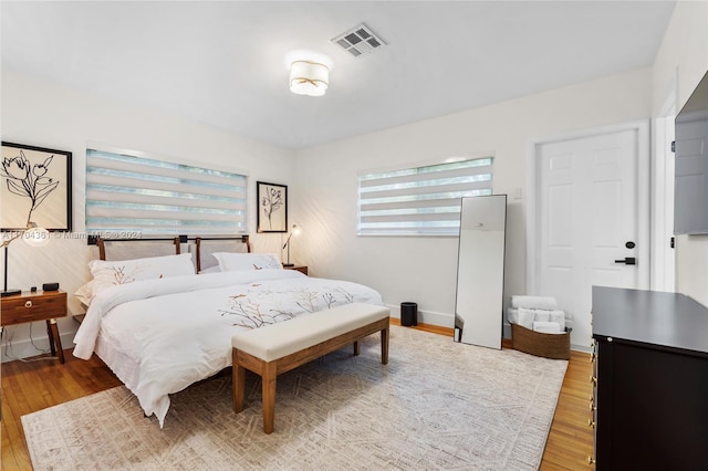 bedroom featuring wood-type flooring