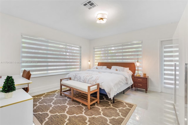 bedroom featuring tile patterned floors