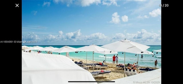 view of water feature with a beach view