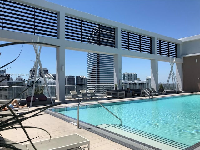 view of pool featuring a patio