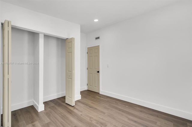 unfurnished bedroom featuring light hardwood / wood-style floors