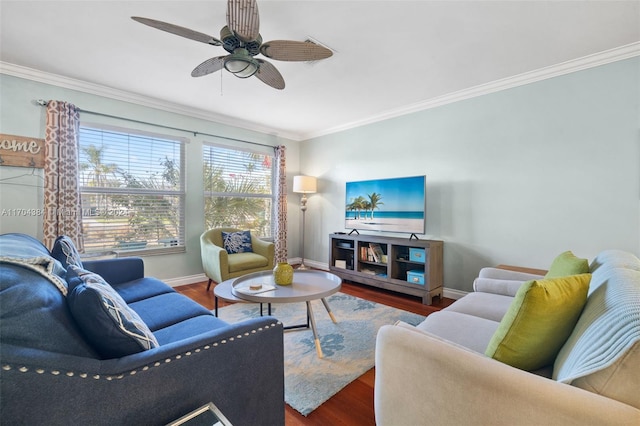 living room featuring ceiling fan, ornamental molding, and hardwood / wood-style flooring