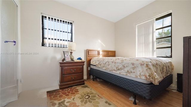 bedroom featuring hardwood / wood-style flooring