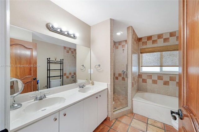 full bathroom with shower with separate bathtub, vanity, and toilet