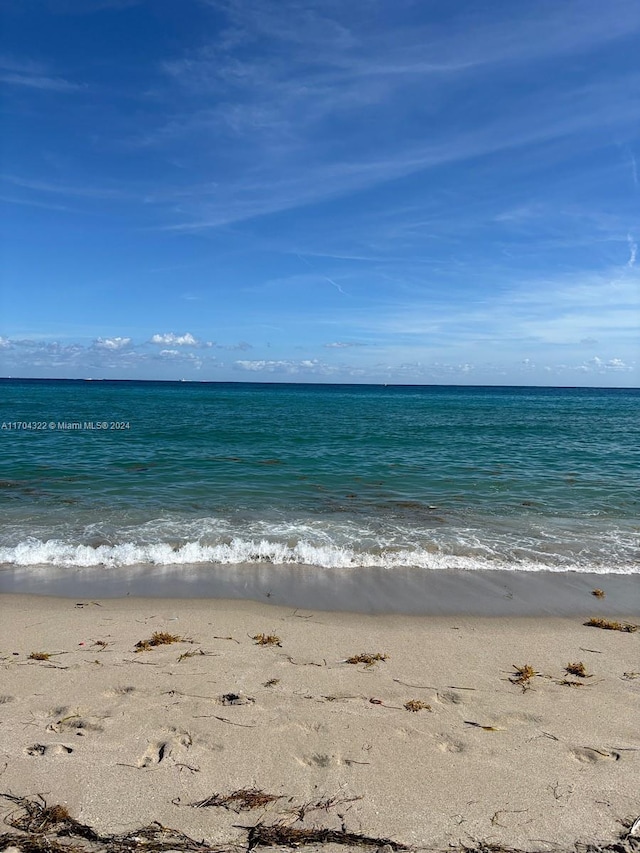 property view of water featuring a view of the beach