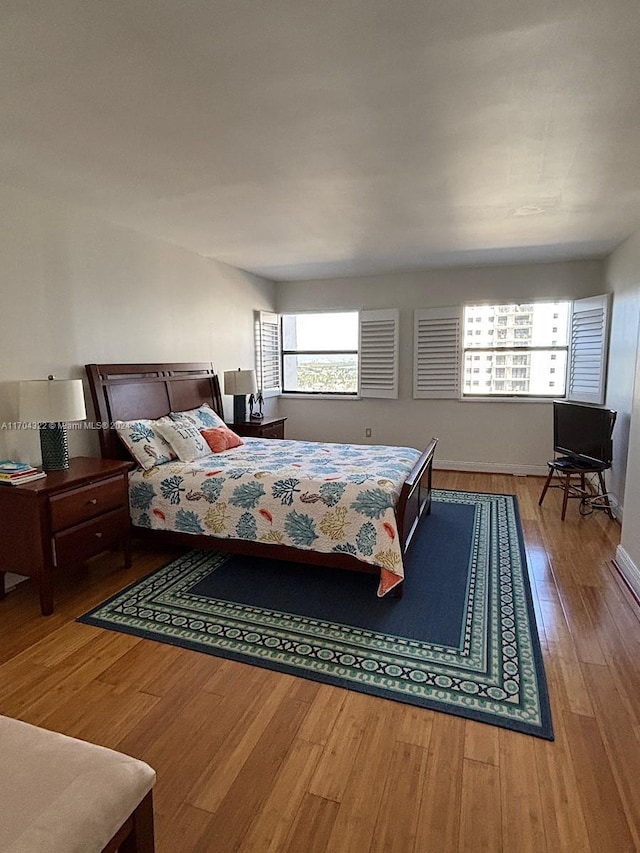 bedroom featuring hardwood / wood-style flooring