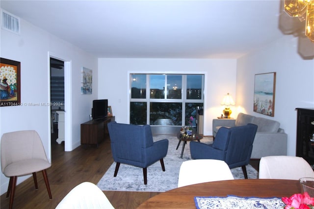 living room with dark hardwood / wood-style floors