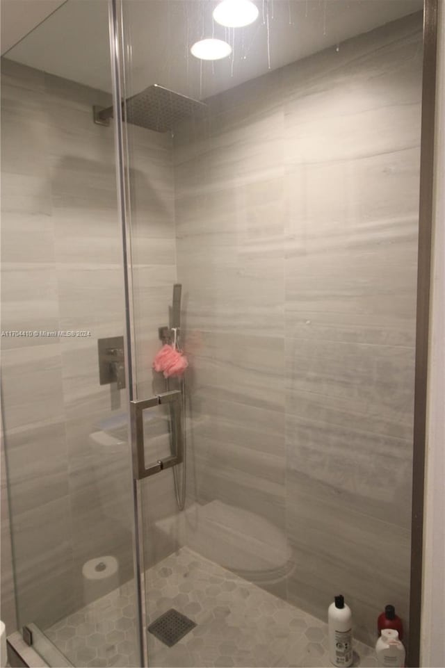 bathroom featuring walk in shower