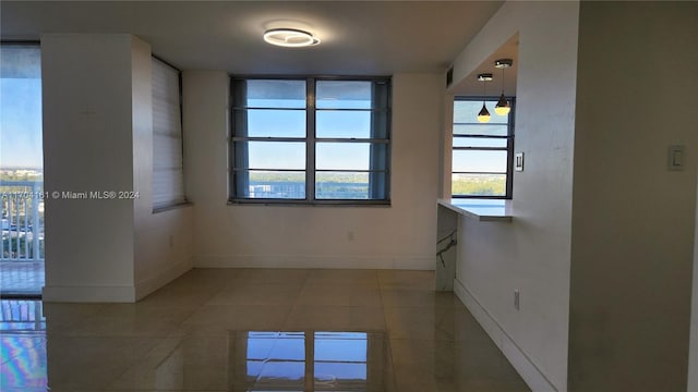 view of tiled spare room