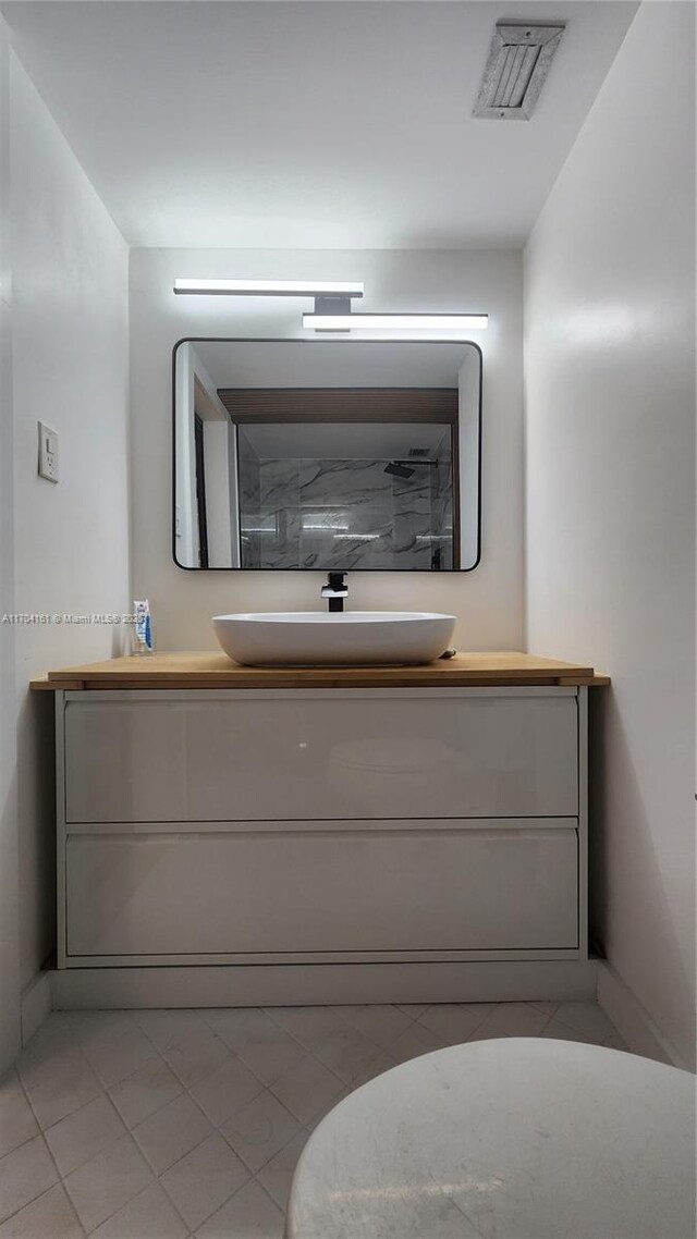 bathroom featuring vanity and tile patterned floors