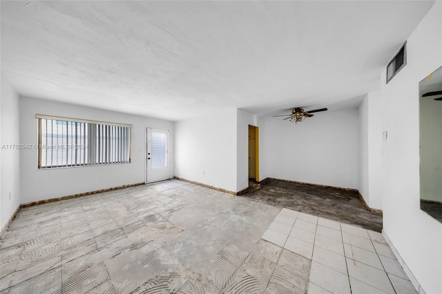 spare room featuring ceiling fan