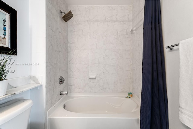 bathroom with toilet and shower / tub combo with curtain