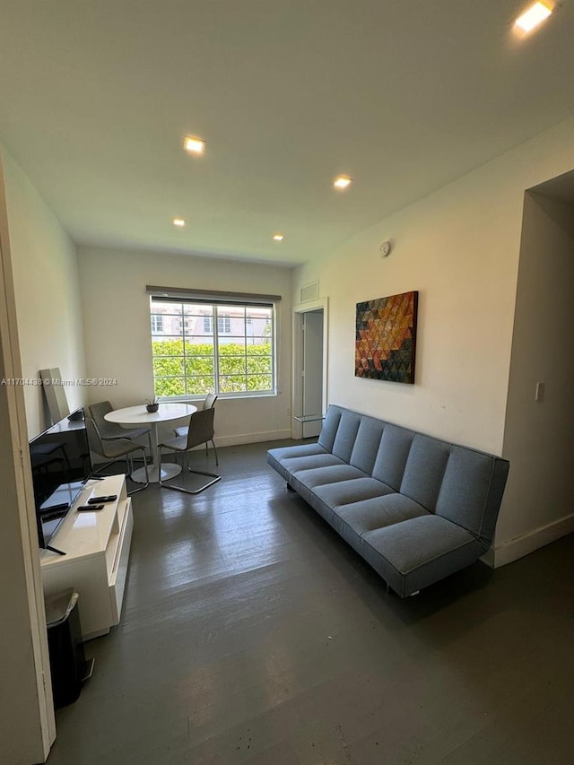 living room with dark wood-type flooring