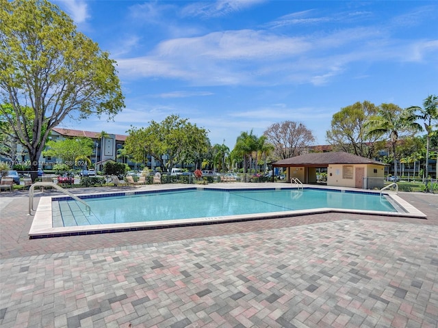 view of pool featuring a patio