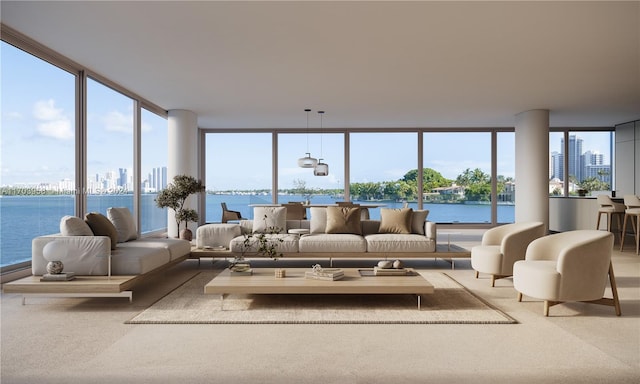 sunroom / solarium with a water view and a wealth of natural light