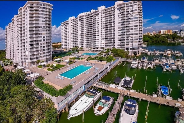 birds eye view of property featuring a water view