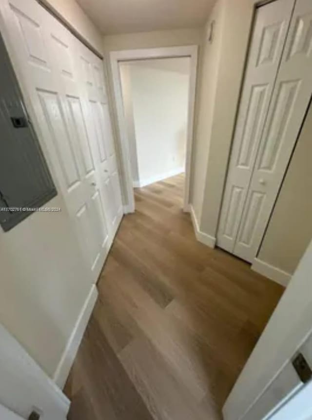 hallway featuring hardwood / wood-style flooring