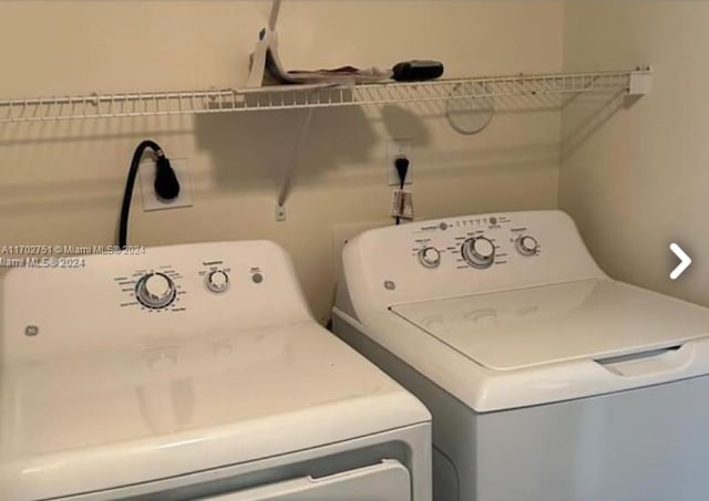 laundry area with independent washer and dryer