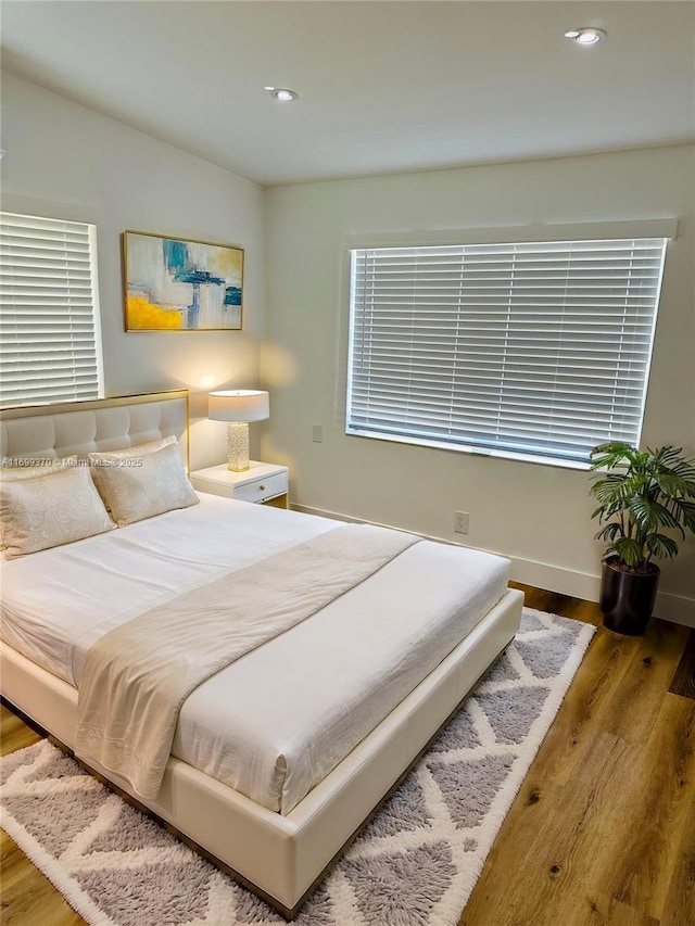 bedroom featuring hardwood / wood-style floors