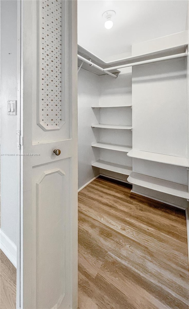 3475 N Country Club Dr Unit 503, Aventura, FL 33180 - spacious closet with wood finished floors