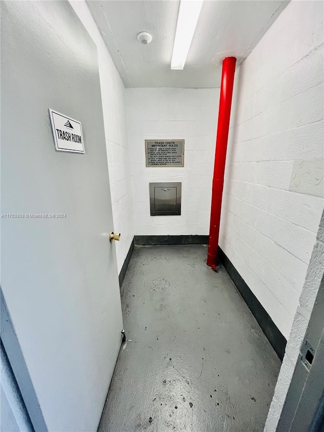 bathroom with concrete flooring