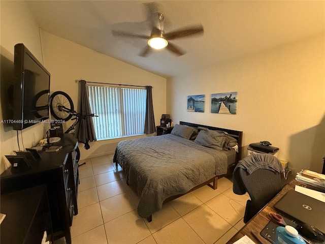 tiled bedroom featuring ceiling fan and lofted ceiling