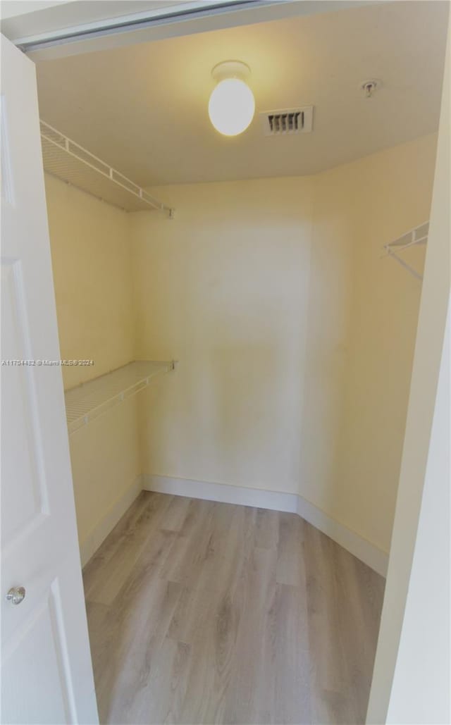 walk in closet featuring light wood-type flooring