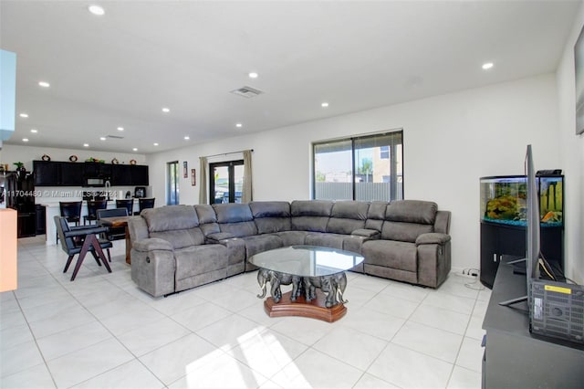 living room featuring light tile patterned floors