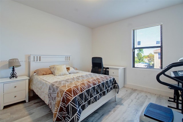 bedroom featuring light wood-type flooring