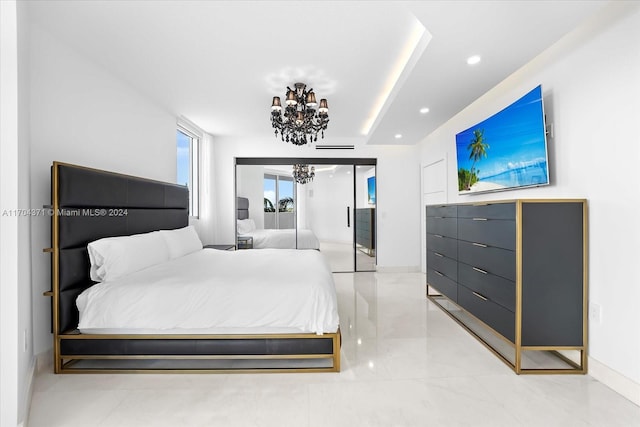 bedroom with a chandelier