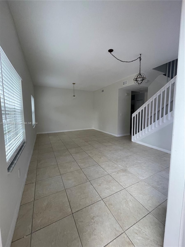 view of tiled spare room