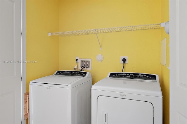 laundry room with washer and dryer