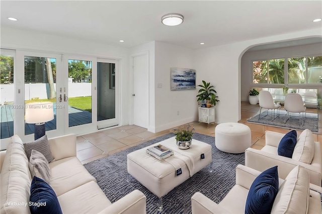 tiled living room with french doors