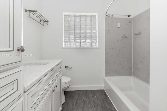 full bathroom featuring hardwood / wood-style flooring, vanity, toilet, and shower / tub combination