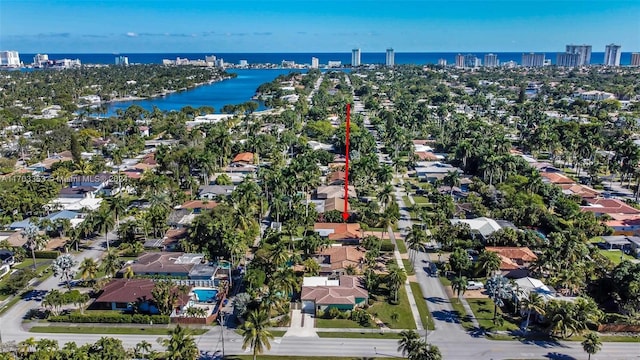 birds eye view of property featuring a water view