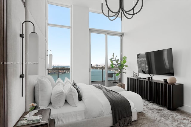 bedroom with a notable chandelier