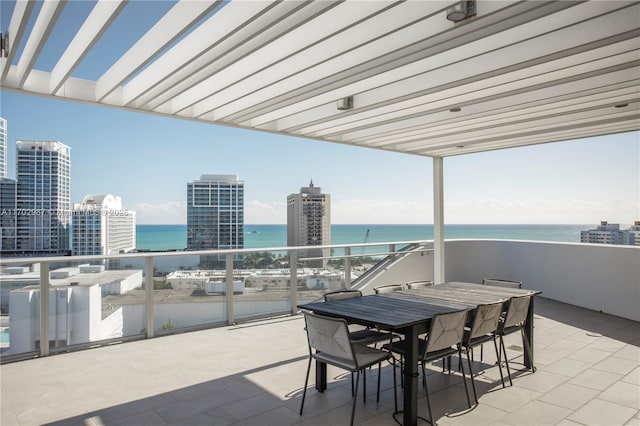 view of patio / terrace with a water view