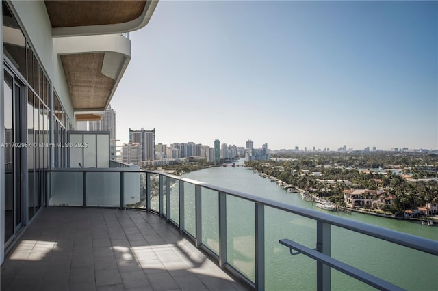 balcony featuring a water view