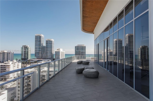 balcony featuring a water view