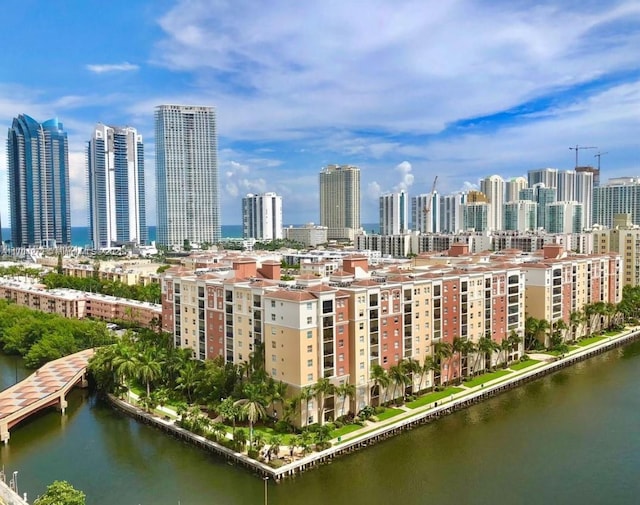 property's view of city featuring a water view