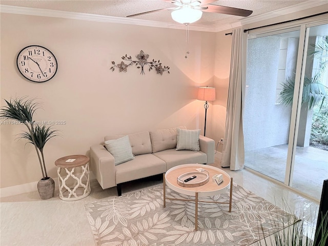 living room featuring a wealth of natural light, crown molding, ceiling fan, and a textured ceiling