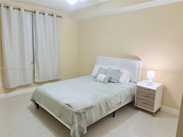 bedroom featuring ceiling fan