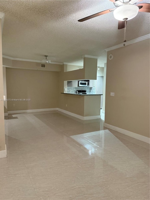 interior space with crown molding, ceiling fan, and a textured ceiling