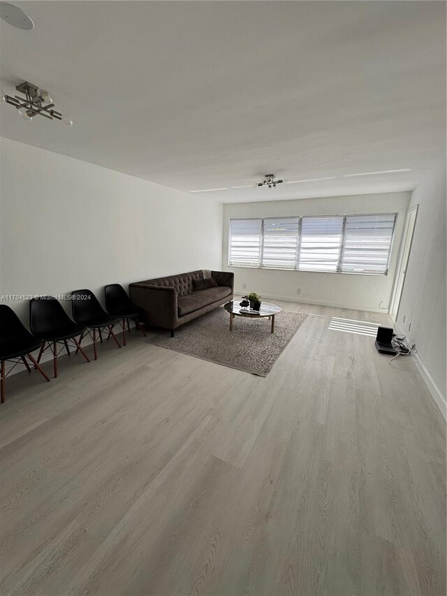 unfurnished living room with light hardwood / wood-style floors