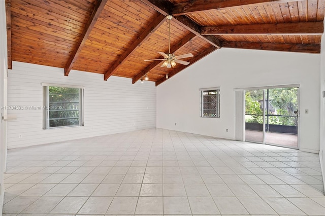 hall with light tile patterned floors and a textured ceiling