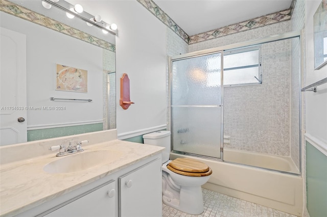 kitchen featuring white cabinetry, white appliances, sink, and light tile patterned floors